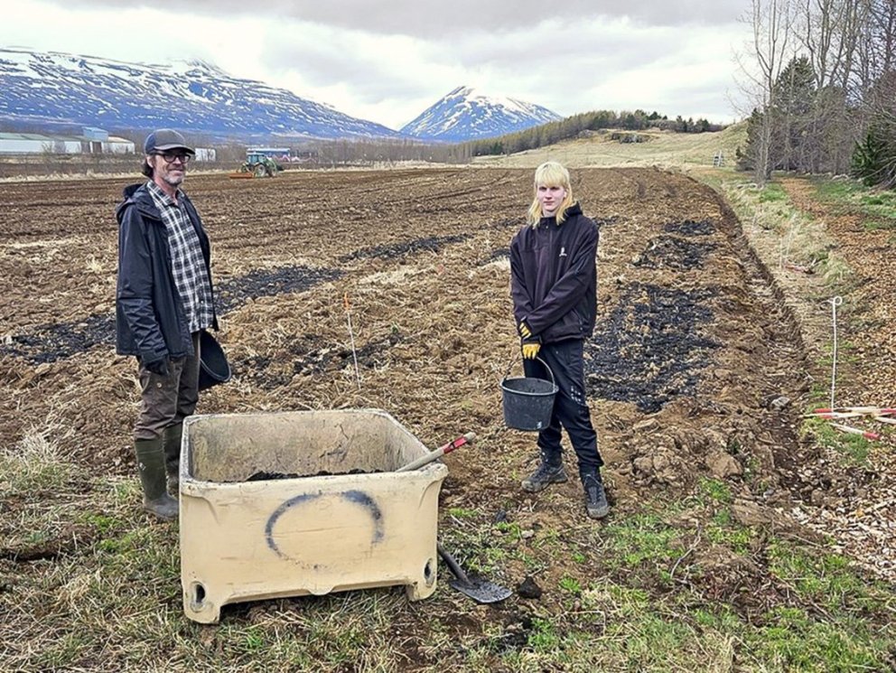 Forest researcher Lárus Heiðarsson and his assistant Björn Sturlaugur Lárusson at work adding Icelan…